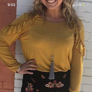 Medium shirt and skirt.